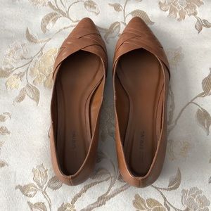 Brown flats with slight wedge heel
